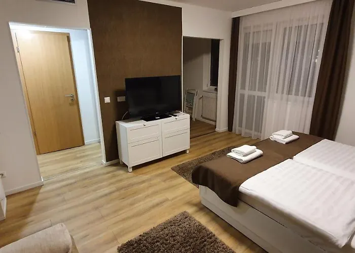 Lägenhet Sunset Wellness Apartman